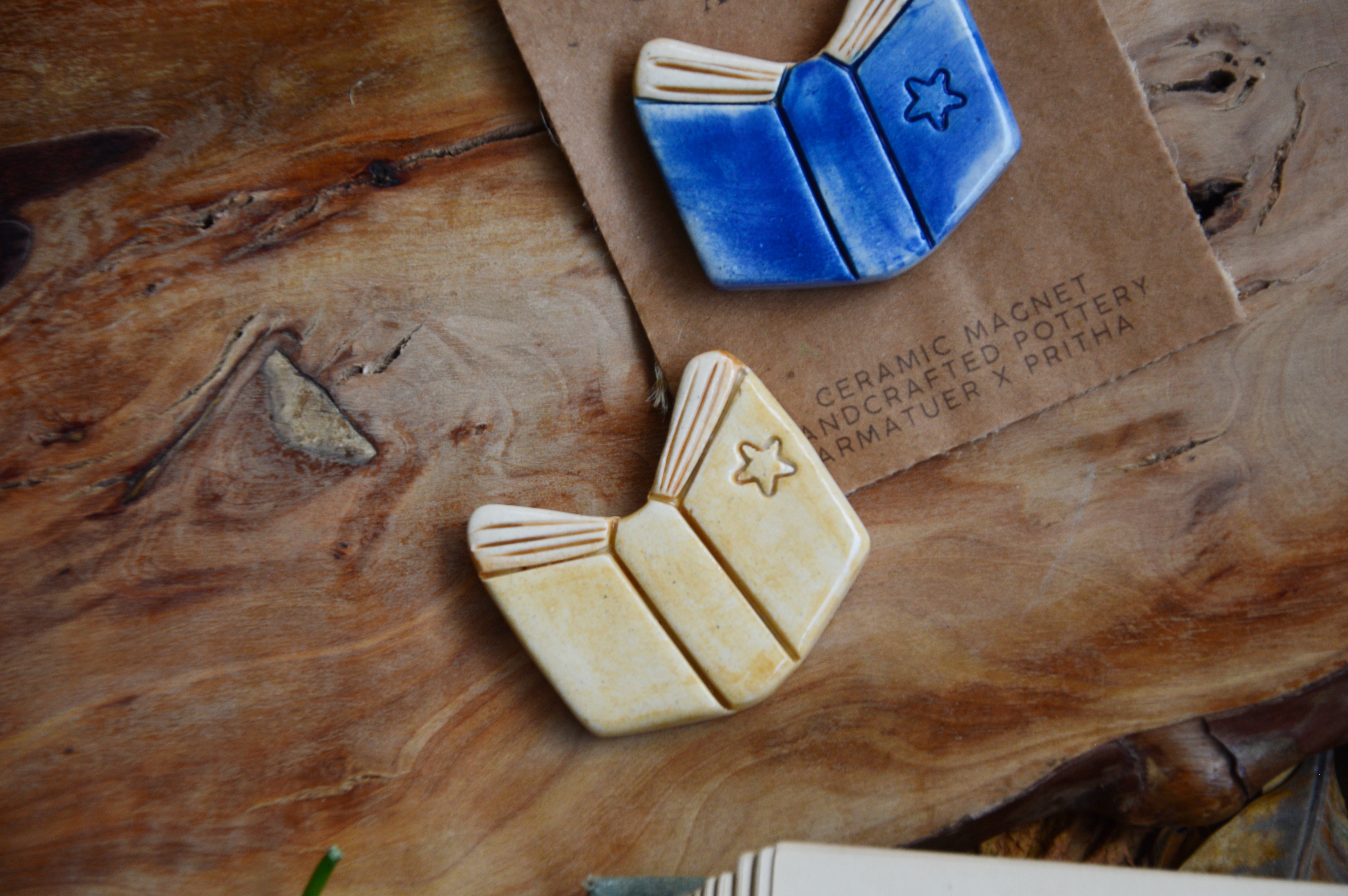 Reading By The Fireside | Hygge Home Ceramic Magnet | Beige Book