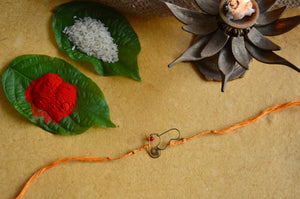 Ganesha Rakhi | Yellow Dori